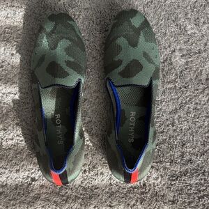 Rothy's Green Camouflage Slip-Ons with Red and Blue Accents